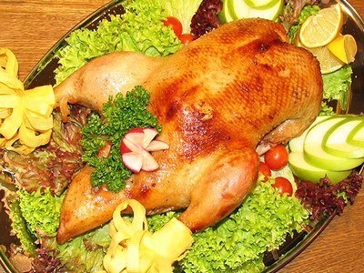 Утка, запеченная с яблоками
