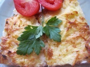КУРИЦА, ЗАПЕЧЕННАЯ ПОД КАРТОФЕЛЕМ