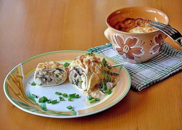 Кальмары в горшочке.