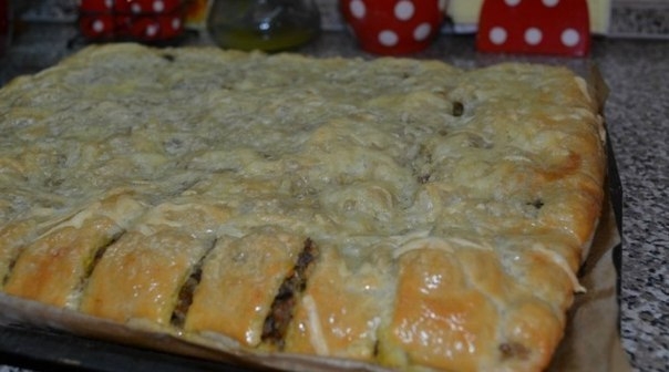 Пирог с печенью и рисом.