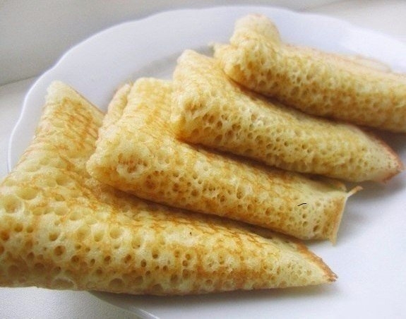 Эти блины получаются очень вкусными, тонкими, нежными. А какие они ажурные, и все-все в дырочках! Эти блины получаются очень вкусными, тонкими, нежными. А какие они ажурные, и все-все в дырочках!